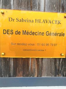 Dr. SABRINA HLAVACEK