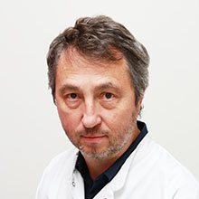 Dr. Luc DE BAYSER